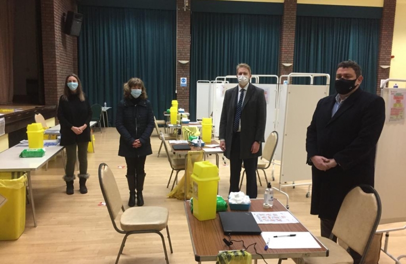 From Left: CCG Medicines Lead Linda Honey, Clinical Dead Dr Caroline Baker, Dr Ben Spencer and Cllr Nick Prescot welcome the begining of covid vaccinations at Chertsey Hall 