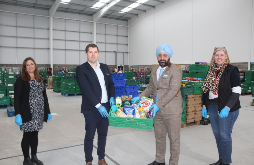 Jenny Wardill (Runnymede Foodbank), Marcus Weatherburn (Foxhills membership manager), Tej Walia (Foxhills general manager), Angela Miller (Runnymede Foodbank).