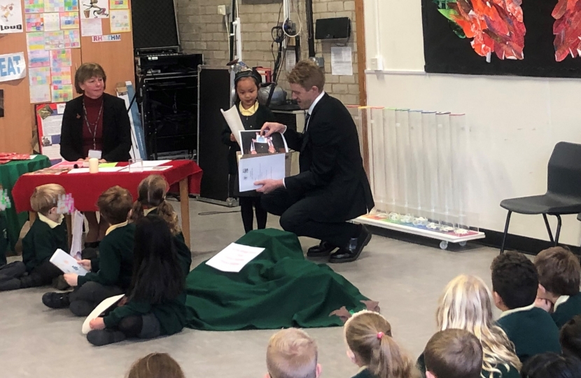 Presenting the winning certificate at the Grange Infant School