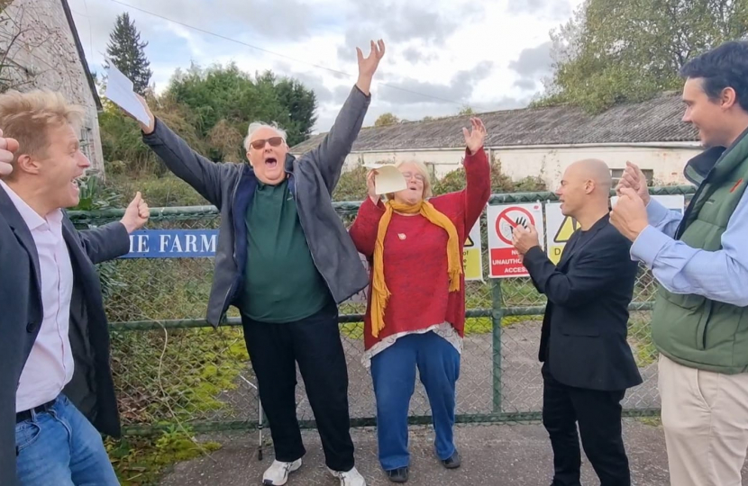 Holme Farm Project Co-ordinators Ronnie and Christine Kendall celebrating with Dr Ben Spencer MP and Cllrs Tom Gracey and Scott Lewis