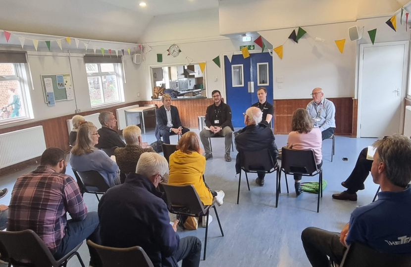 Dr Ben Spencer hosts a meeting of flood group representatives, with officers from Surrey County Council and the Environment Agency