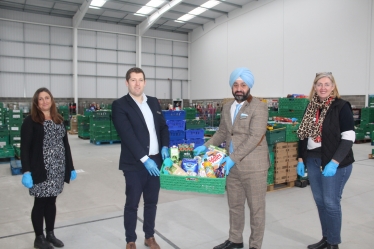 Jenny Wardill (Runnymede Foodbank), Marcus Weatherburn (Foxhills membership manager), Tej Walia (Foxhills general manager), Angela Miller (Runnymede Foodbank).