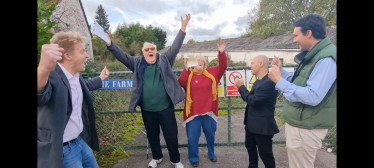 Holme Farm Project Co-ordinators Ronnie and Christine Kendall celebrating with Dr Ben Spencer MP and Cllrs Tom Gracey and Scott Lewis