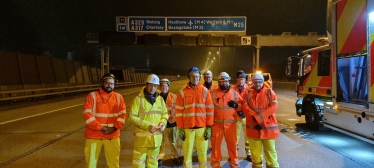 Dr Ben Spencer with Highways crews on M25 concrete surface